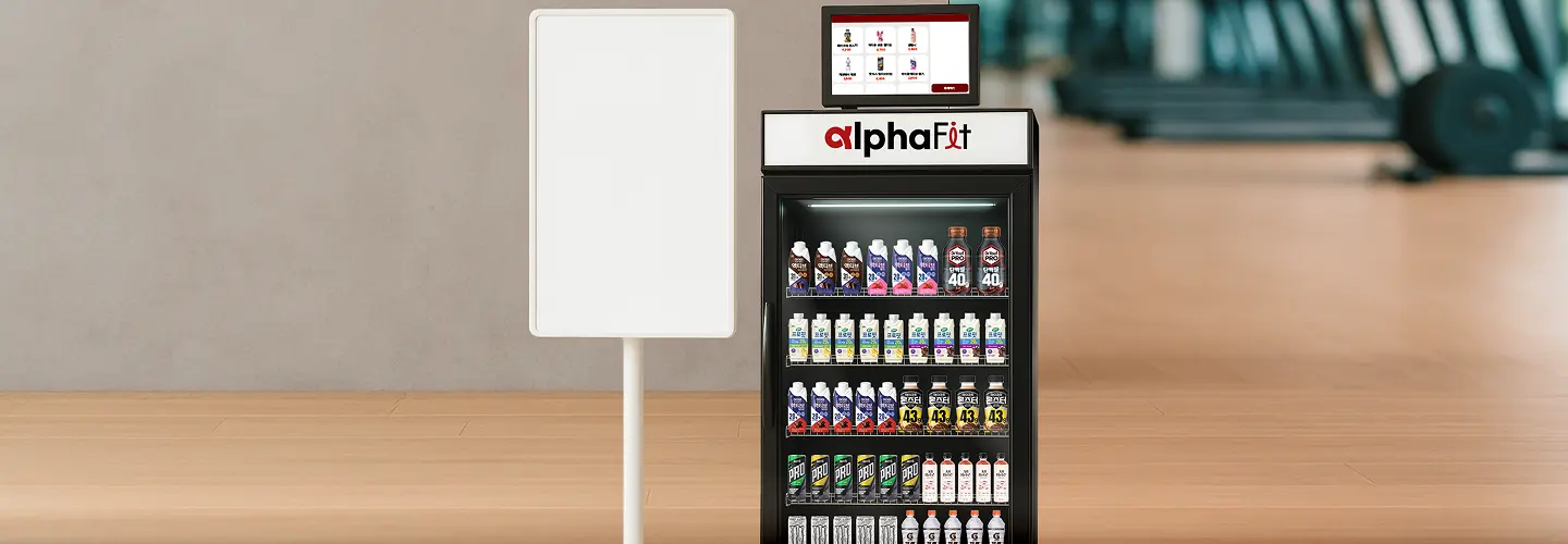 알파핏 헬스장 무인판매기 - 광고 모니터와 냉장 쇼케이스 통합 솔루션
